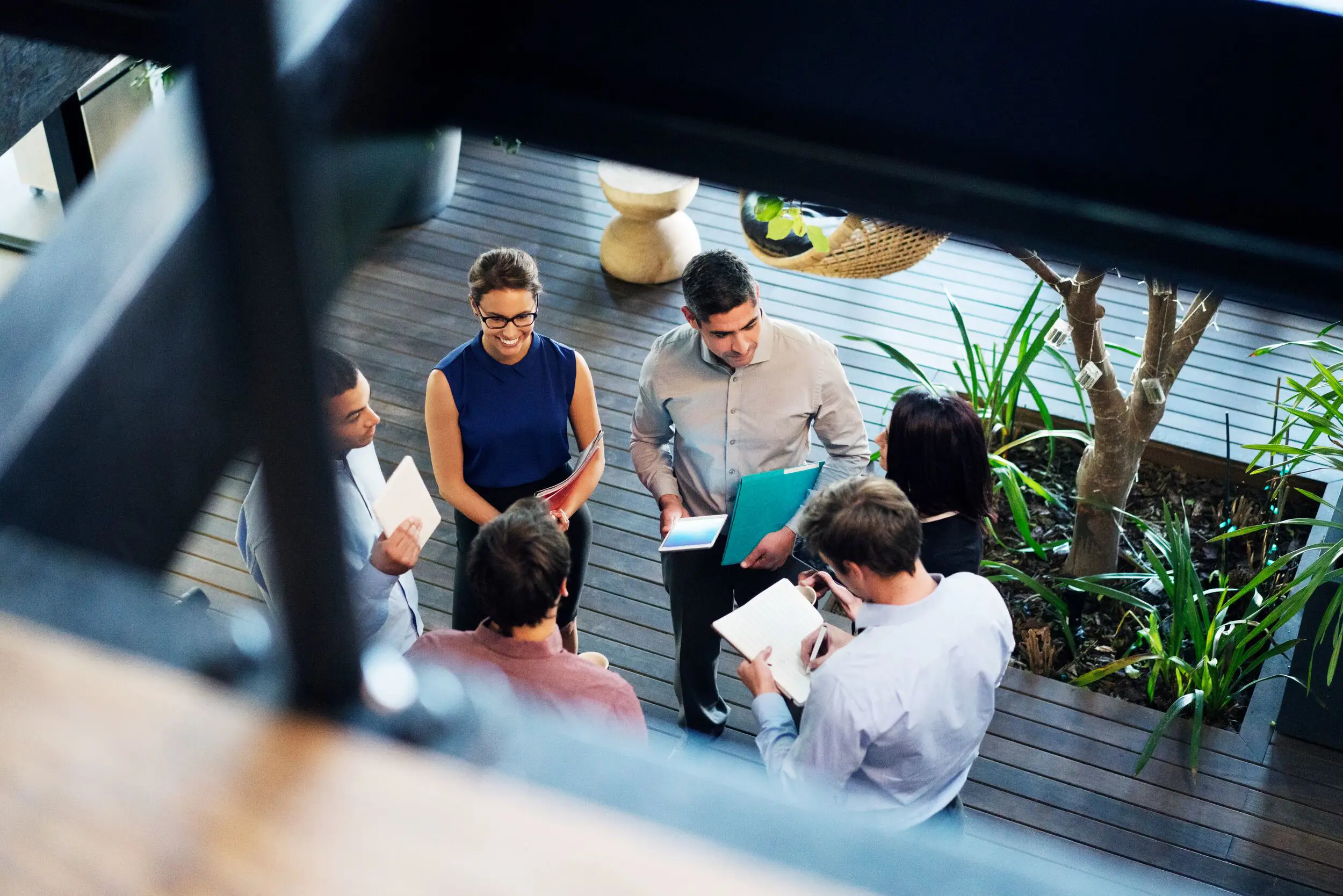 Ariel view of coworkers meeting.