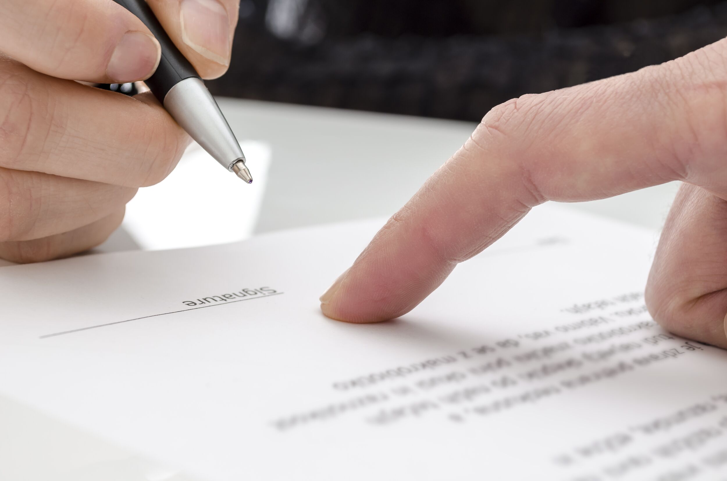 Signing a contract.